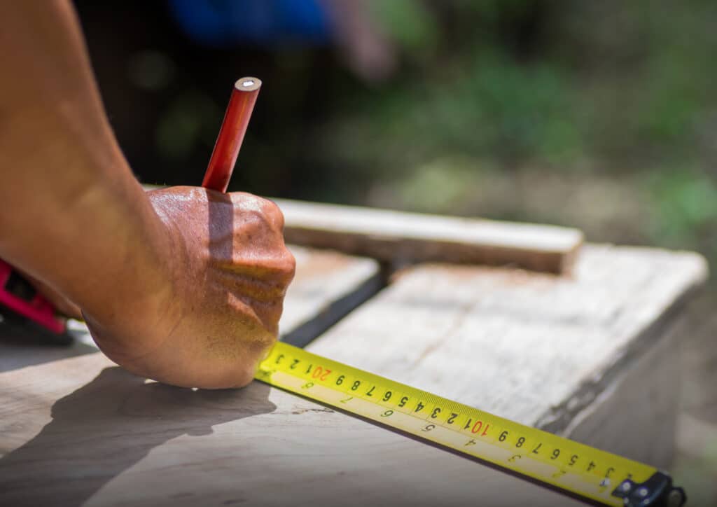 Builder Measuring a Block of Land 2048x1448 - 1